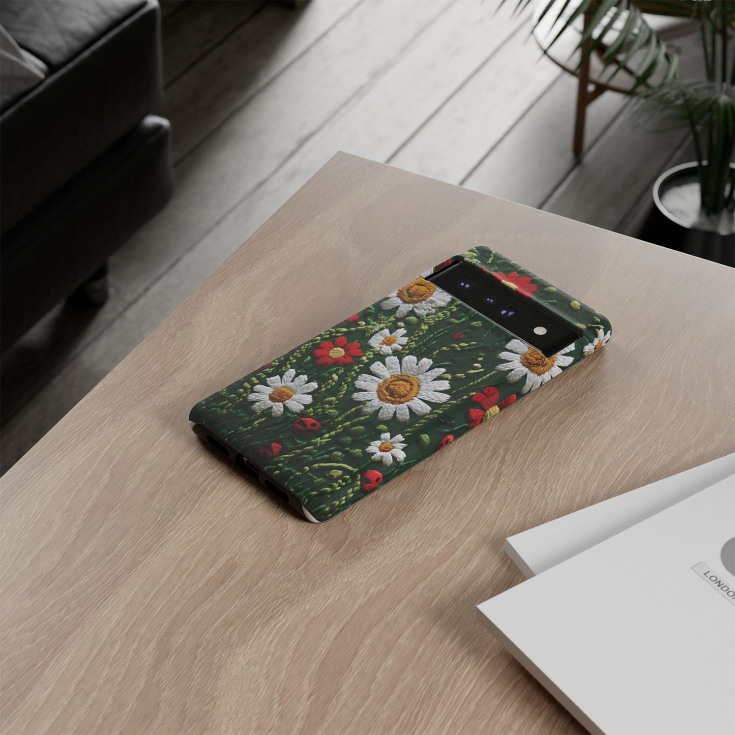 Intricate Embroidered Fabric Featuring Daisies And Ladybugs phone case design
