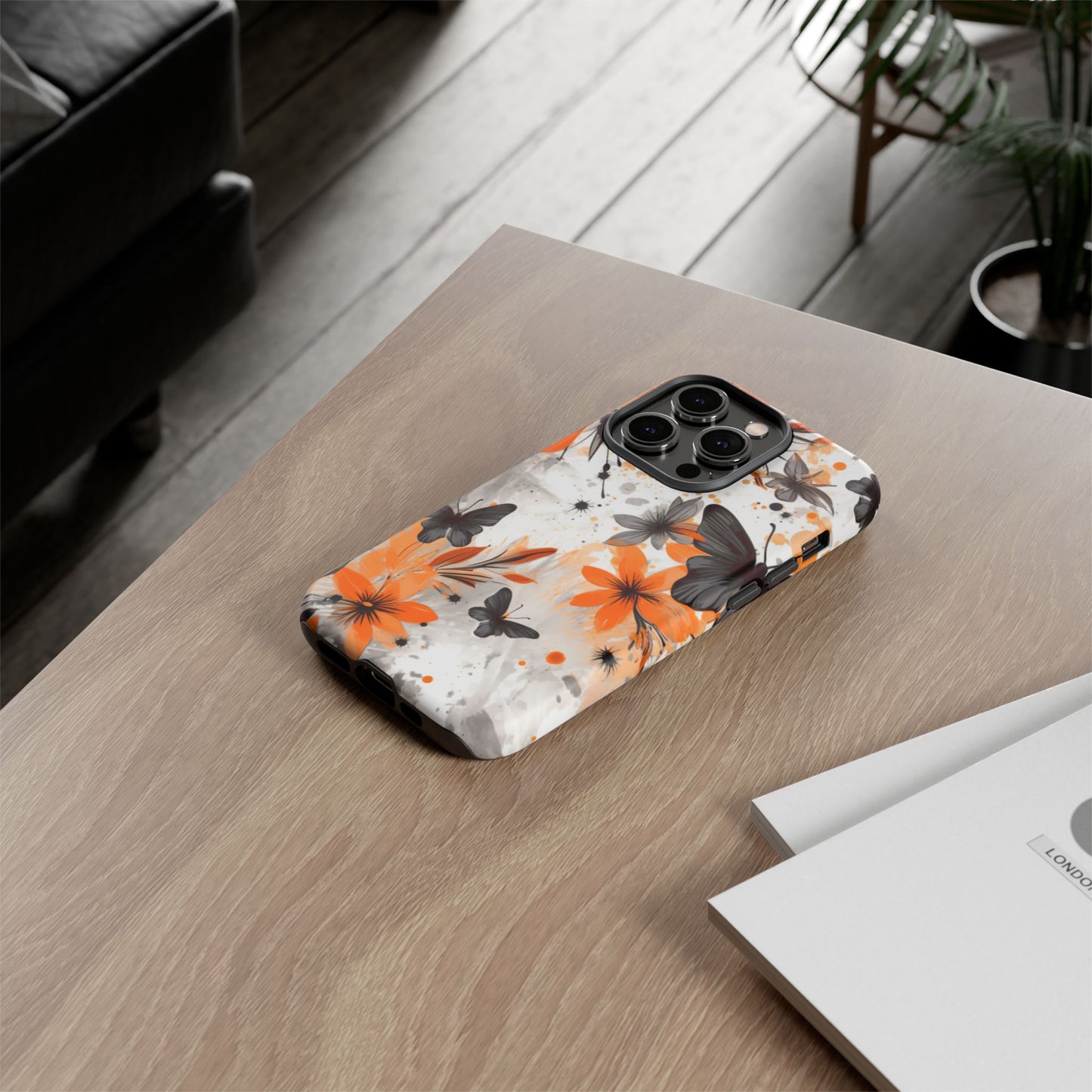 Bold Butterfly & Floral Splash Mobile Cover – Black & Orange Aesthetic