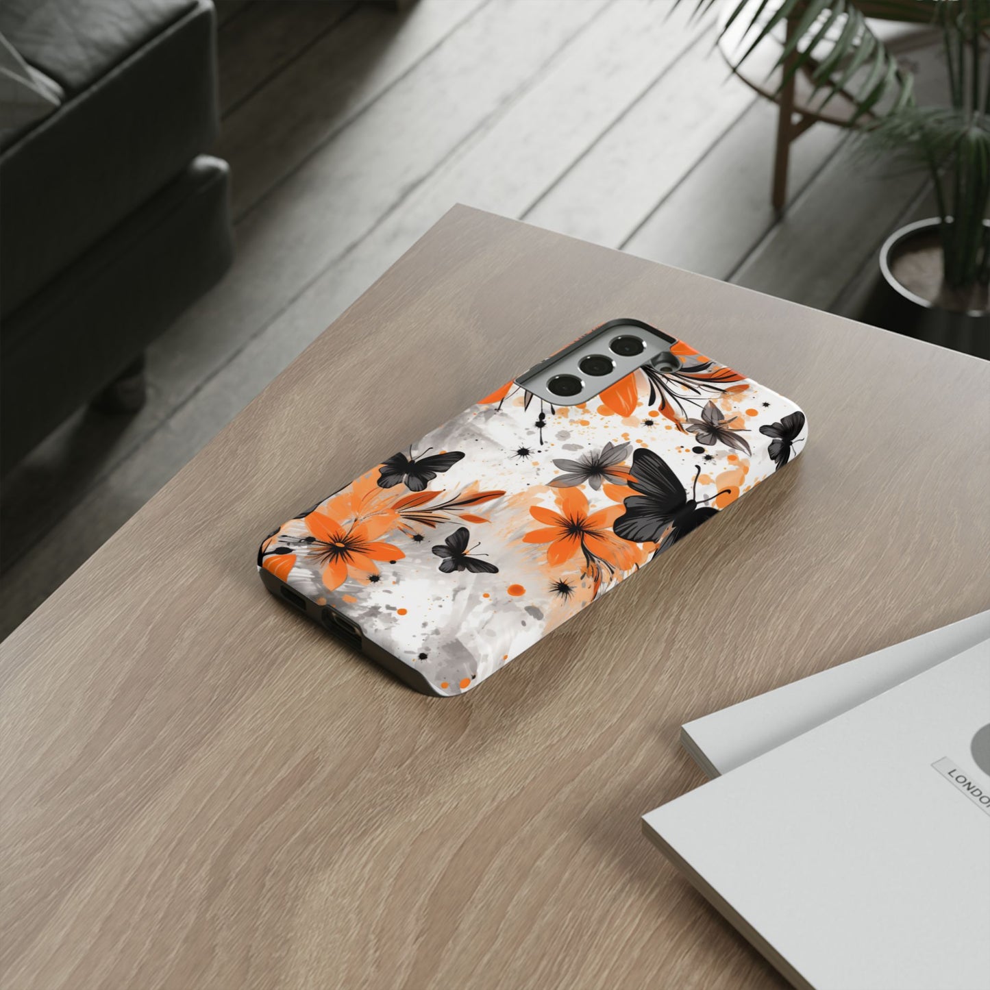 Bold Butterfly & Floral Splash Mobile Cover – Black & Orange Aesthetic