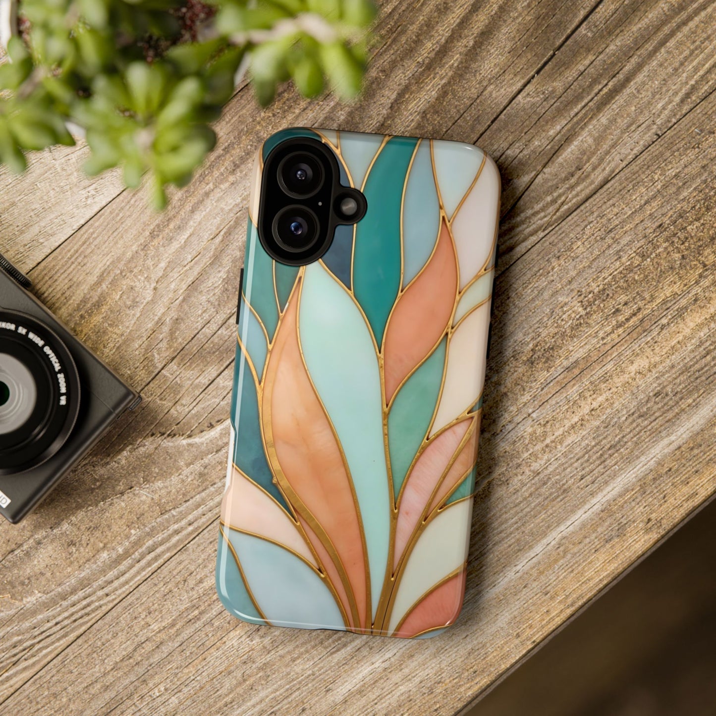 Geometric Leaves: Teal, Peach, and Gold Harmony