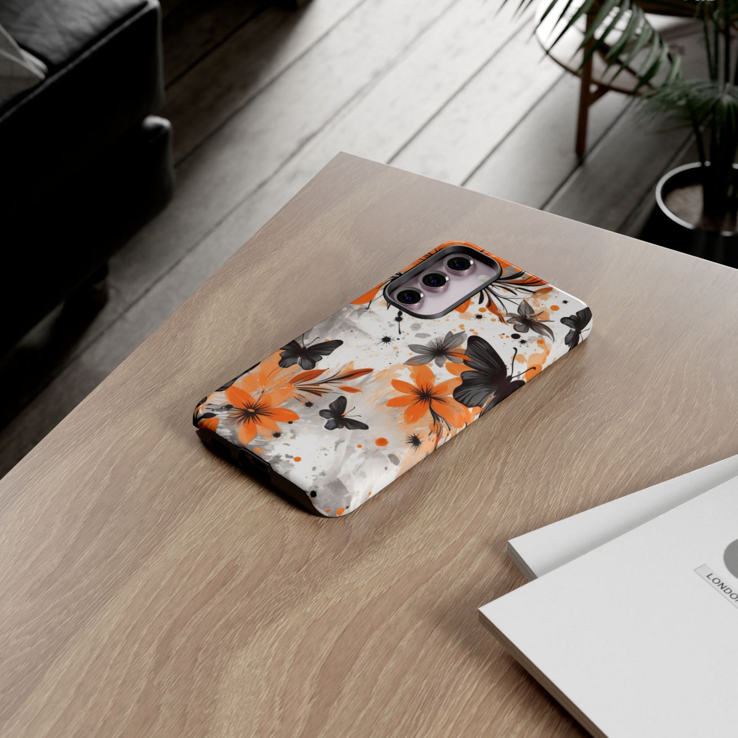 Bold Butterfly & Floral Splash Mobile Cover – Black & Orange Aesthetic
