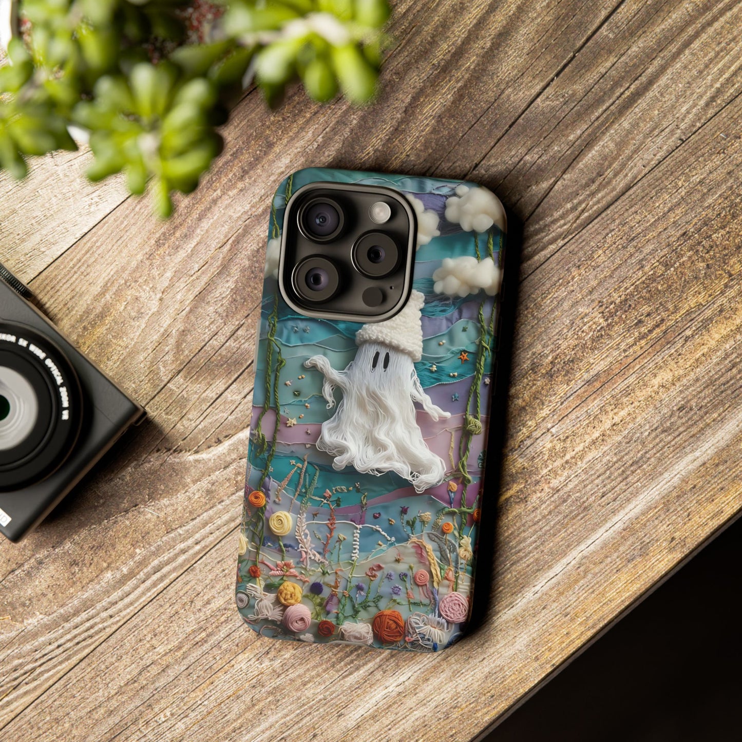 Whimsical Ghost Surrounded By Vibrant Embroidered Flowers phone case design.