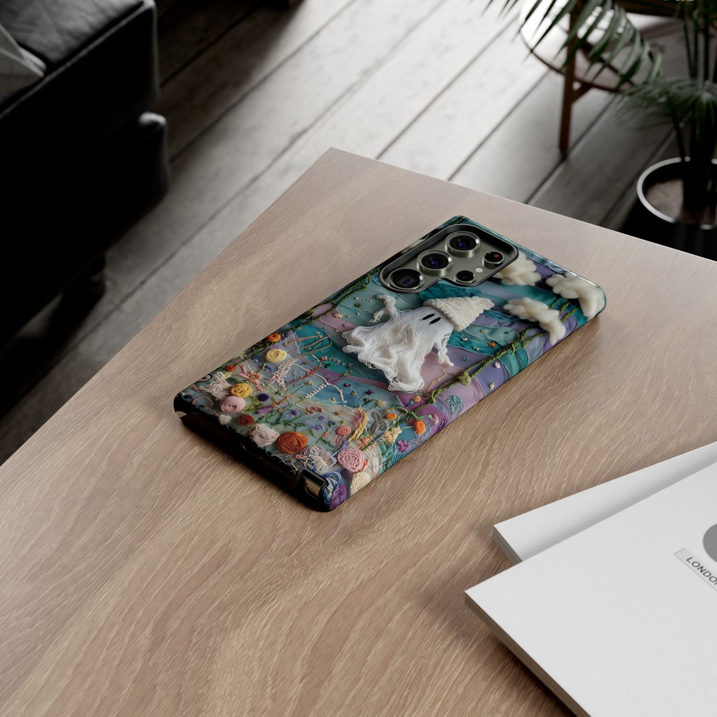 Whimsical Ghost Surrounded By Vibrant Embroidered Flowers phone case design.