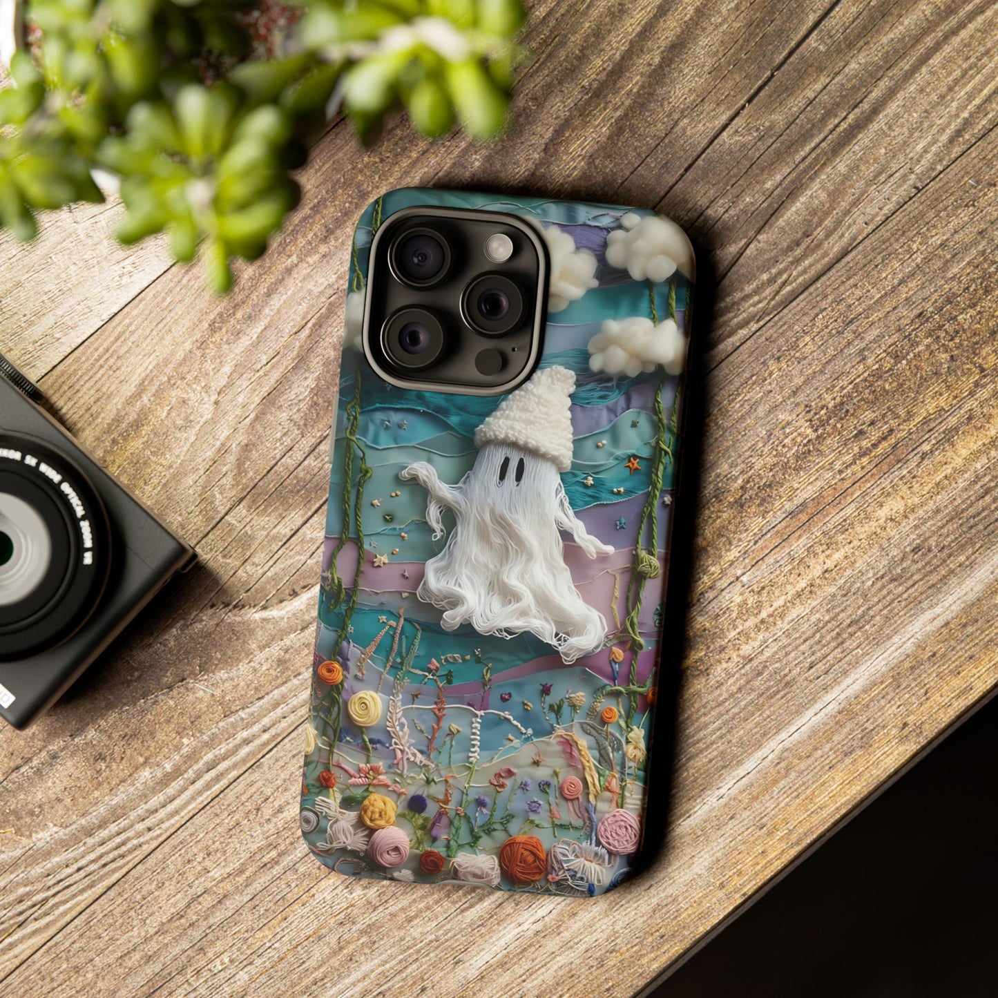 Whimsical Ghost Surrounded By Vibrant Embroidered Flowers phone case design.