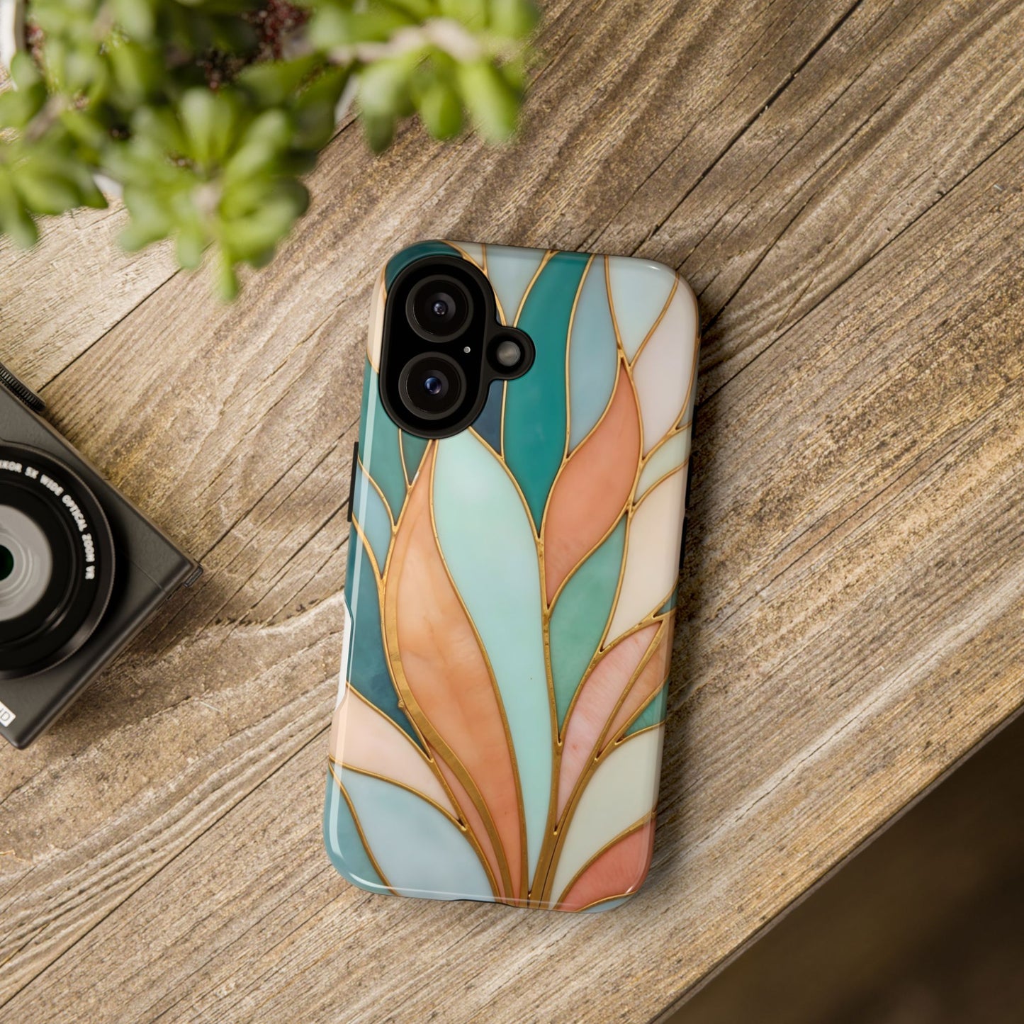 Geometric Leaves: Teal, Peach, and Gold Harmony