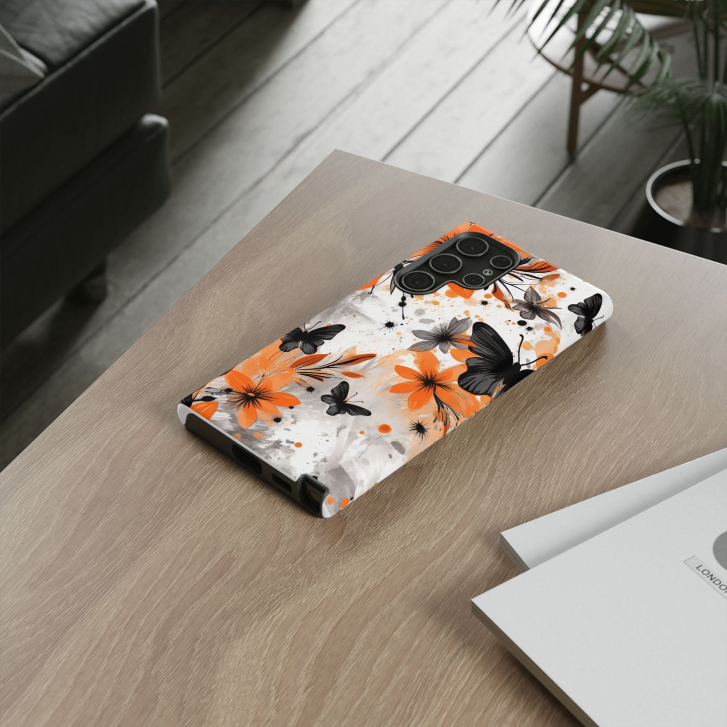 Bold Butterfly & Floral Splash Mobile Cover – Black & Orange Aesthetic