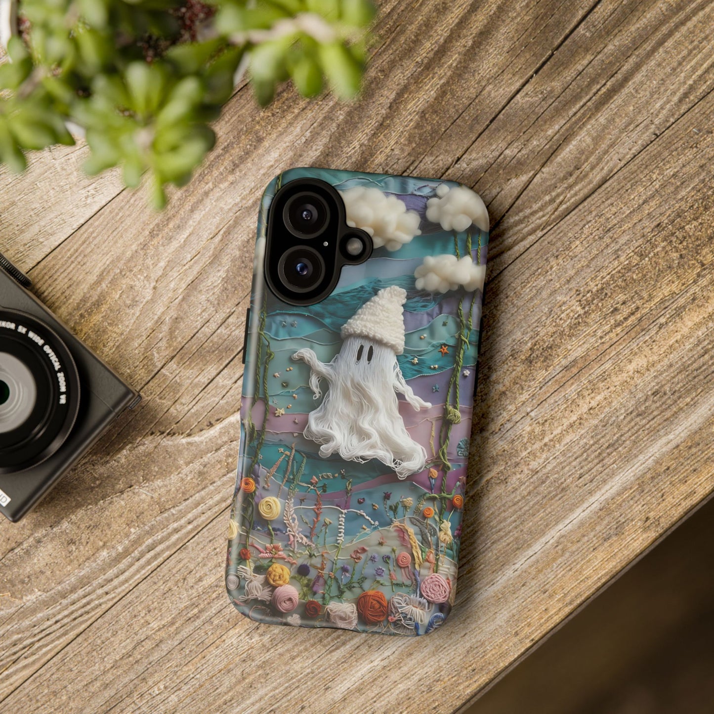 Whimsical Ghost Surrounded By Vibrant Embroidered Flowers phone case design.