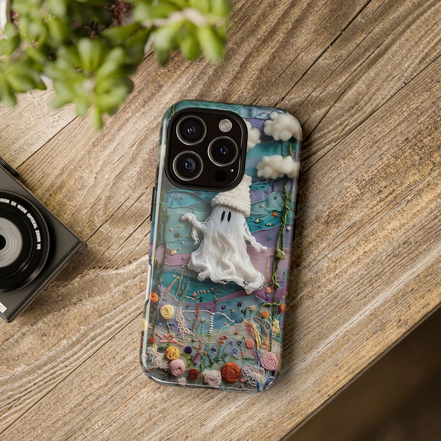 Whimsical Ghost Surrounded By Vibrant Embroidered Flowers phone case design.