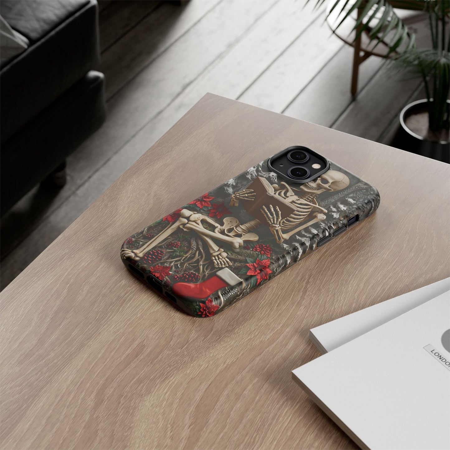 Surreal Relief Sculpture of Skeleton Reading Amidst Festive Decor phone case design