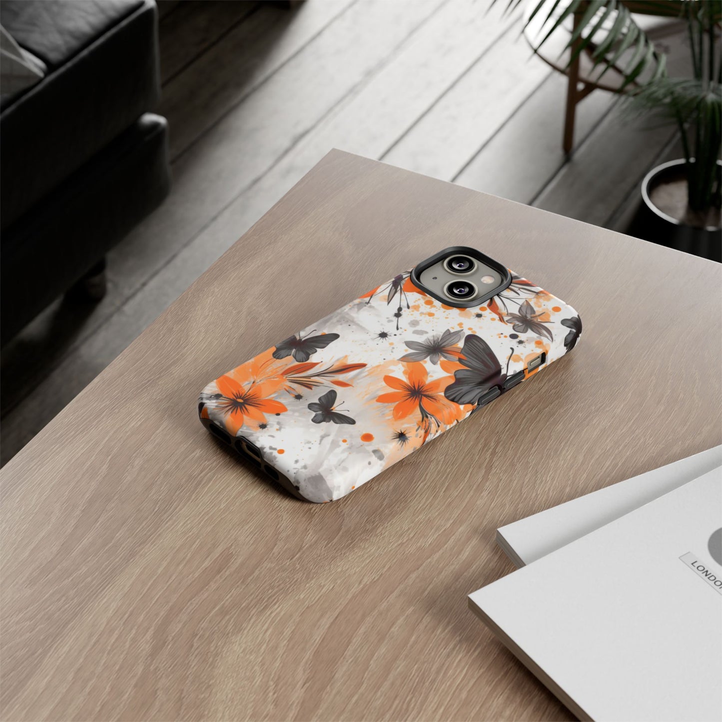 Bold Butterfly & Floral Splash Mobile Cover – Black & Orange Aesthetic