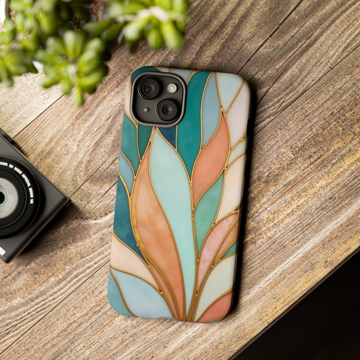 Geometric Leaves: Teal, Peach, and Gold Harmony