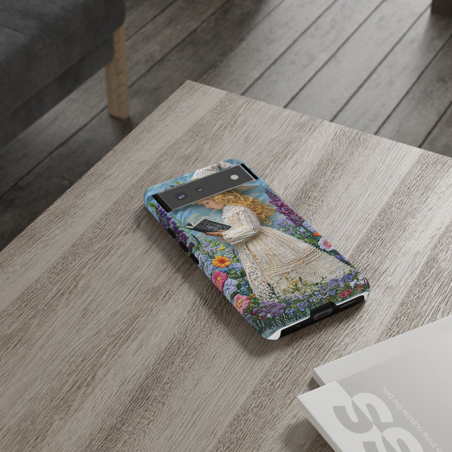 Whimsical Embroidery Of A Girl Reading In A Garden phone case design.