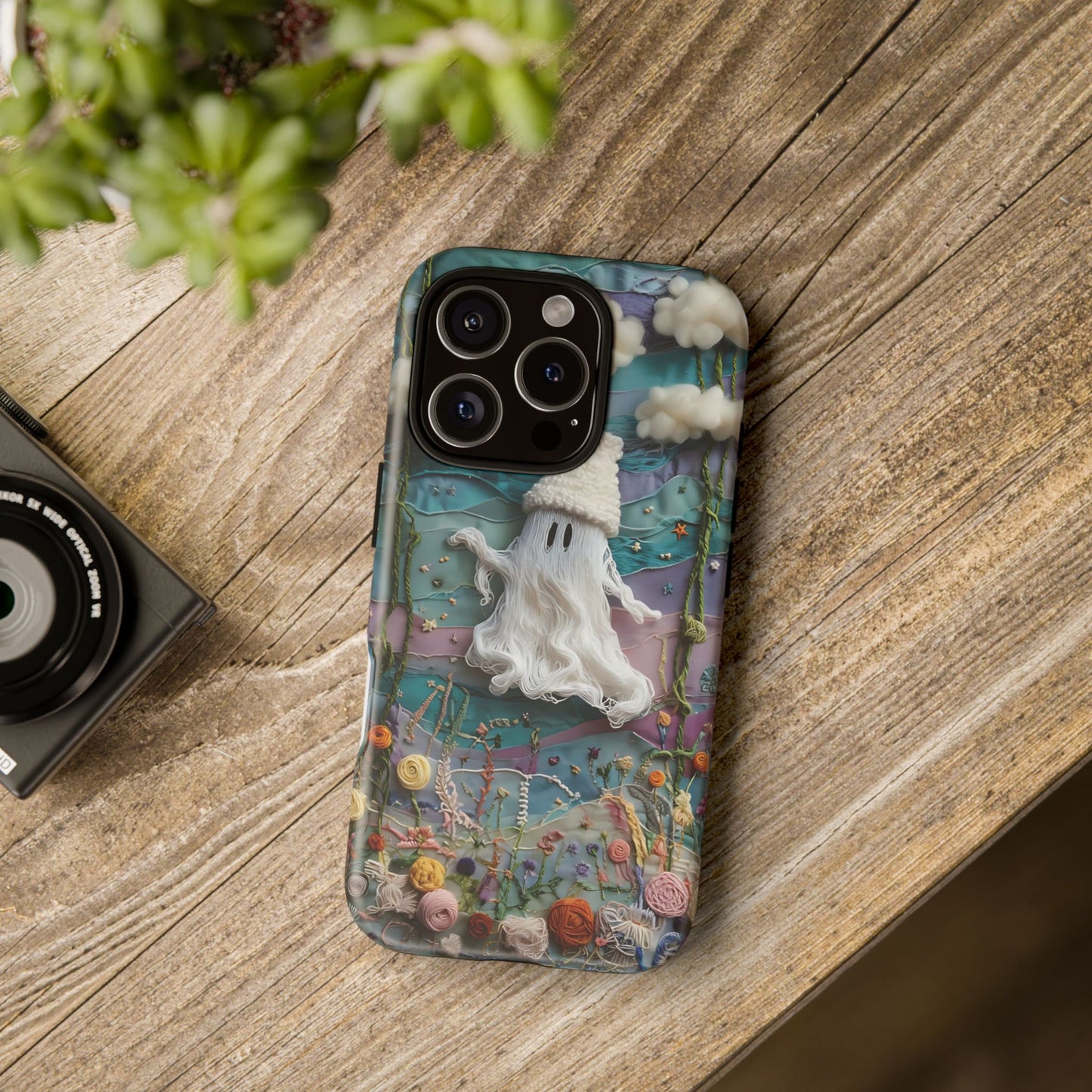 Whimsical Ghost Surrounded By Vibrant Embroidered Flowers phone case design.