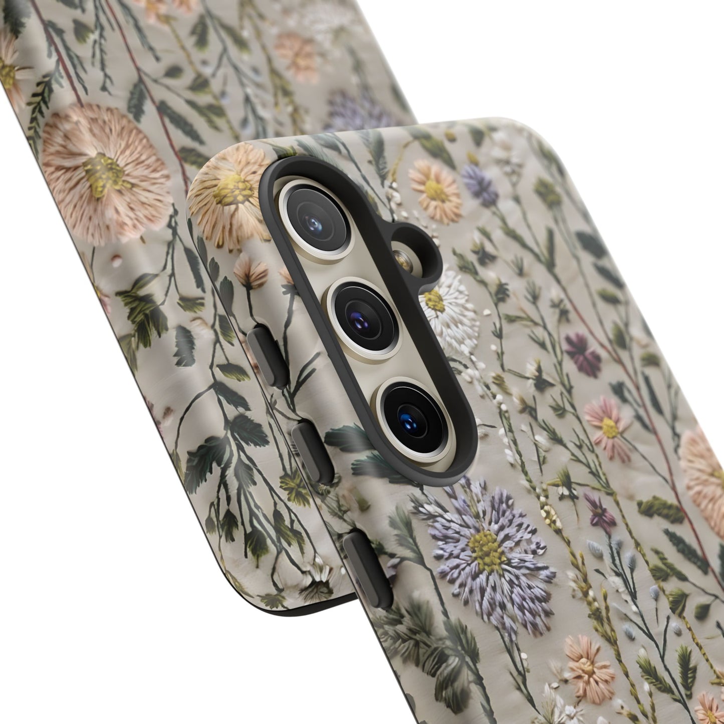 Intricate Embroidery Artwork Featuring Botanical Elements On Beige phone case design.