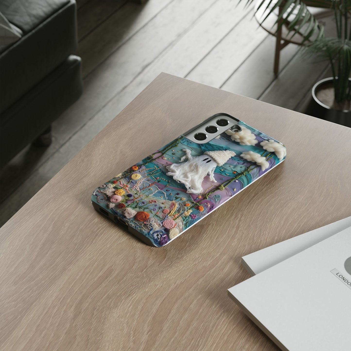 Whimsical Ghost Surrounded By Vibrant Embroidered Flowers phone case design.