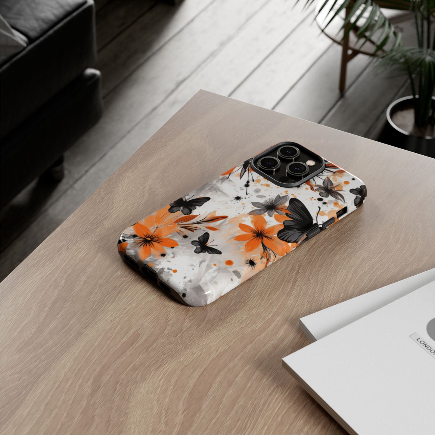 Bold Butterfly & Floral Splash Mobile Cover – Black & Orange Aesthetic