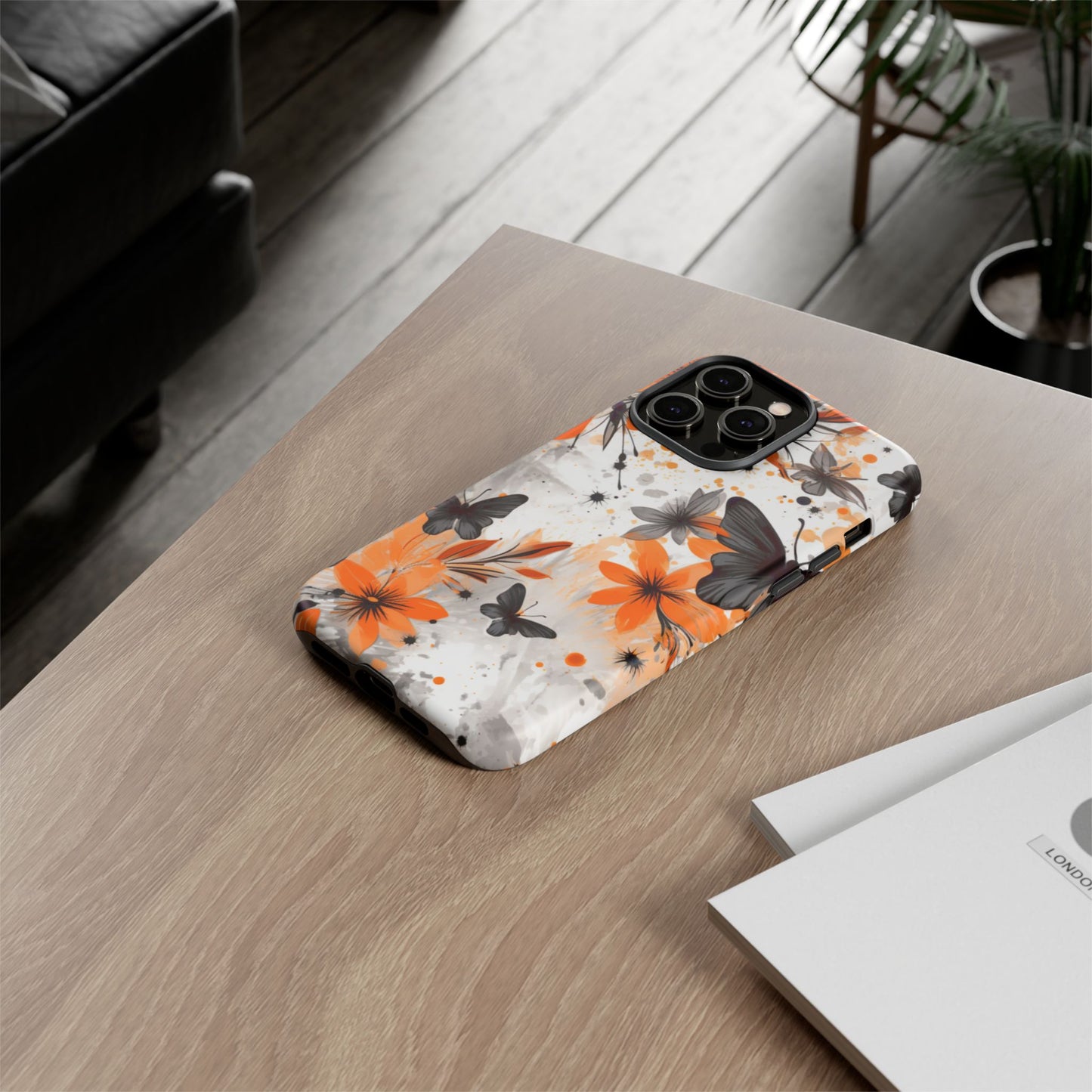 Bold Butterfly & Floral Splash Mobile Cover – Black & Orange Aesthetic