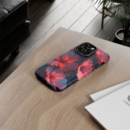 Vibrant red and pink hibiscus flowers blooming against a dark background| Floral phone case design