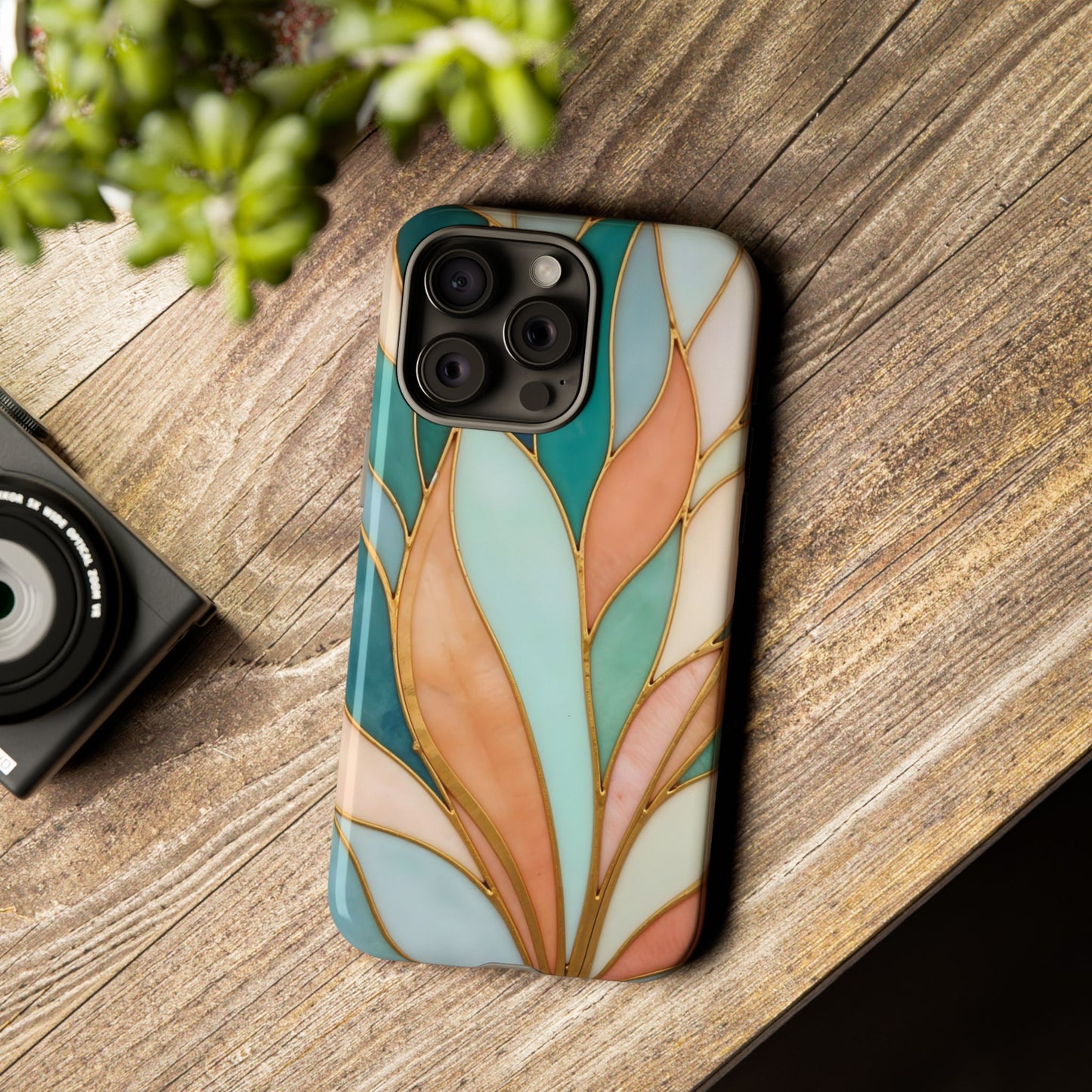 Geometric Leaves: Teal, Peach, and Gold Harmony