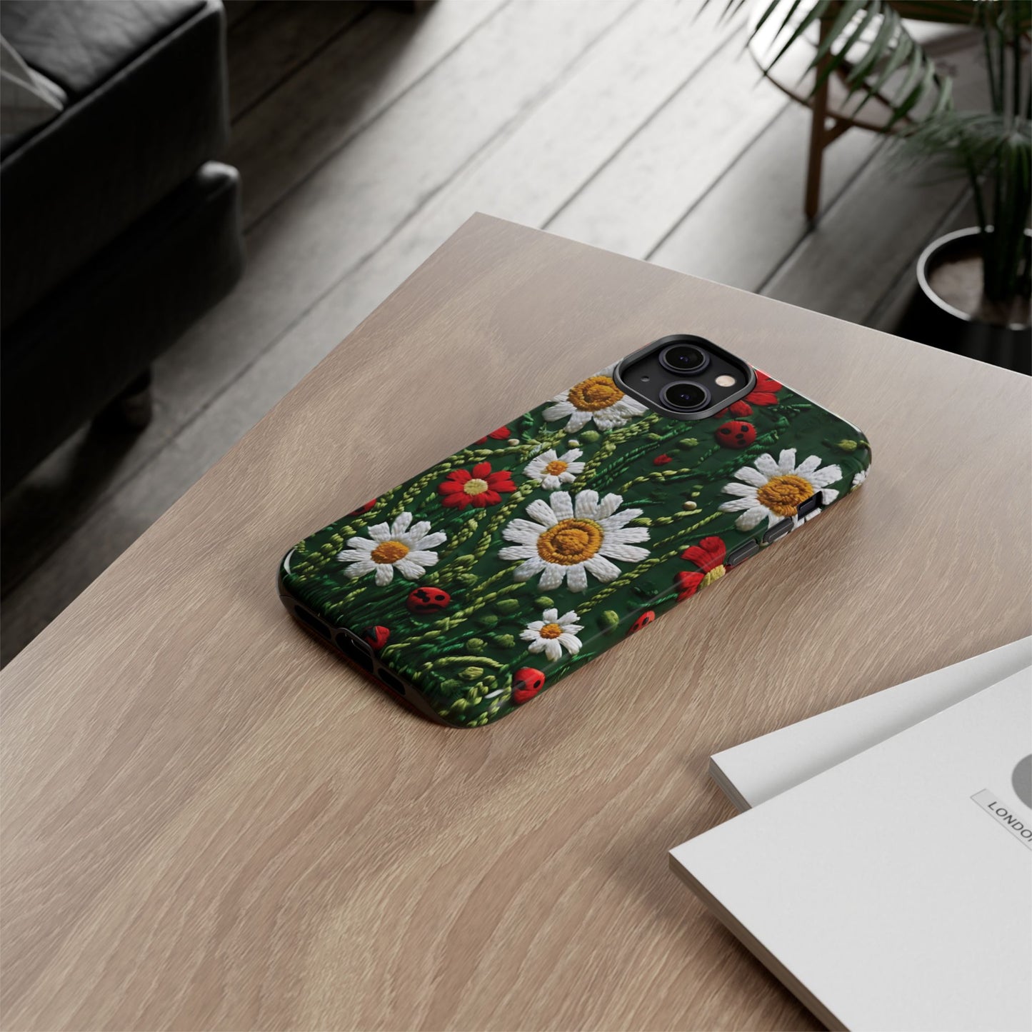 Intricate Embroidered Fabric Featuring Daisies And Ladybugs phone case design