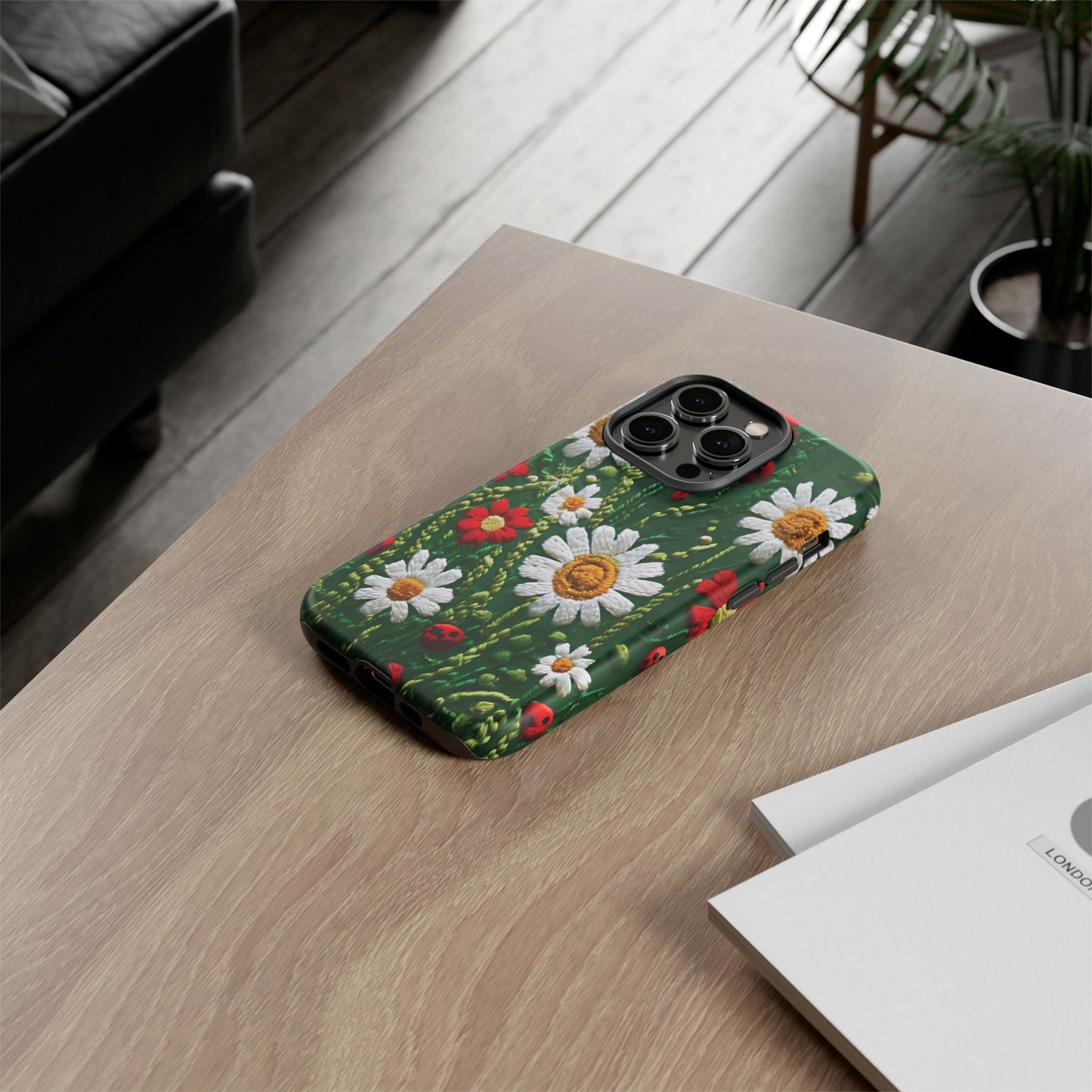 Intricate Embroidered Fabric Featuring Daisies And Ladybugs phone case design