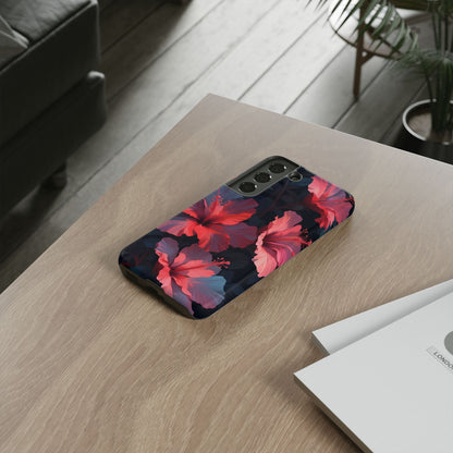Vibrant red and pink hibiscus flowers blooming against a dark background| Floral phone case design