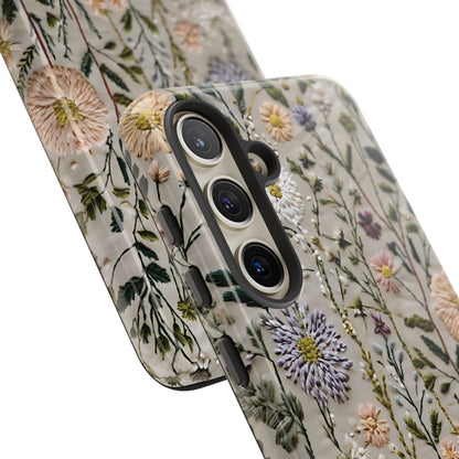 Intricate Embroidery Artwork Featuring Botanical Elements On Beige phone case design.