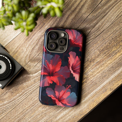 Vibrant red and pink hibiscus flowers blooming against a dark background| Floral phone case design