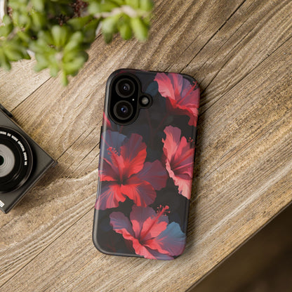 Vibrant red and pink hibiscus flowers blooming against a dark background| Floral phone case design