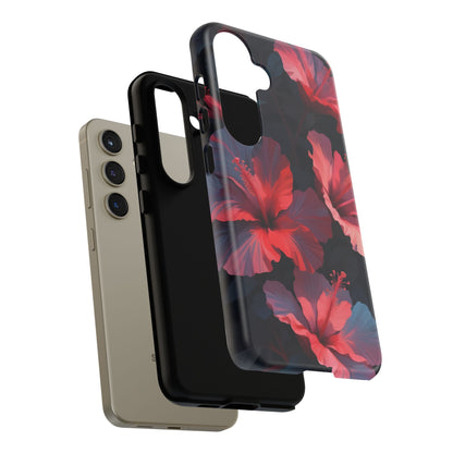 Vibrant red and pink hibiscus flowers blooming against a dark background| Floral phone case design