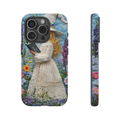 Whimsical Embroidery Of A Girl Reading In A Garden phone case design.
