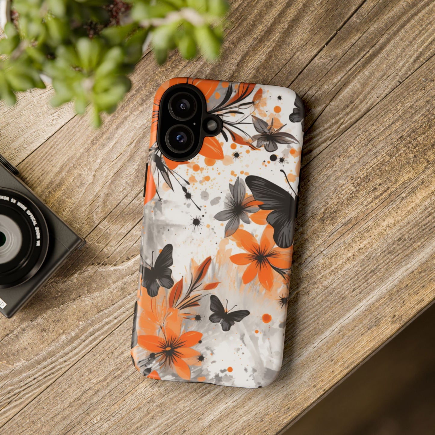 Bold Butterfly & Floral Splash Mobile Cover – Black & Orange Aesthetic