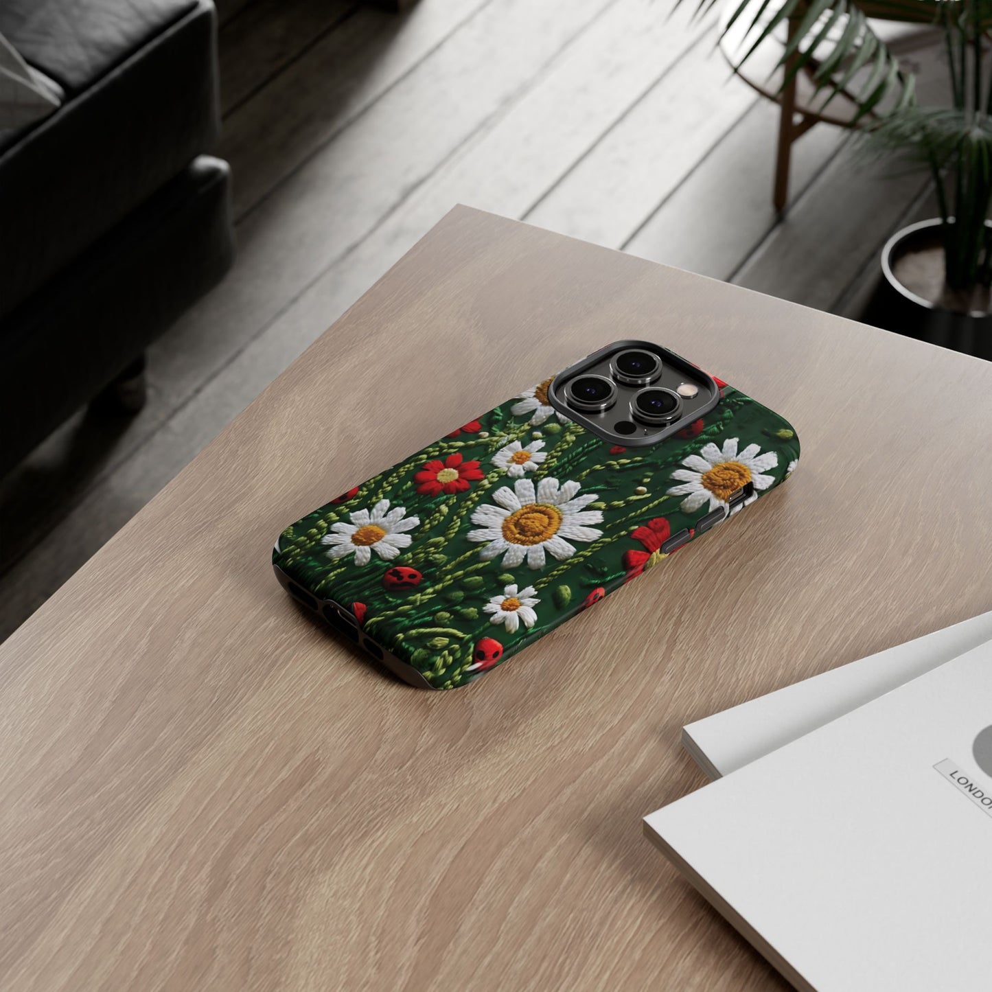 Intricate Embroidered Fabric Featuring Daisies And Ladybugs phone case design
