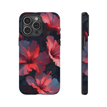 Vibrant red and pink hibiscus flowers blooming against a dark background| Floral phone case design