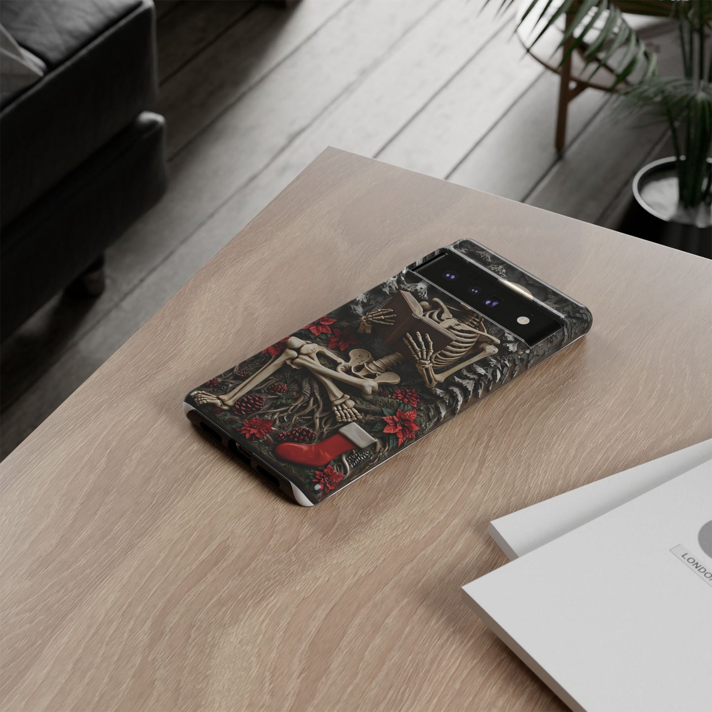 Surreal Relief Sculpture of Skeleton Reading Amidst Festive Decor phone case design
