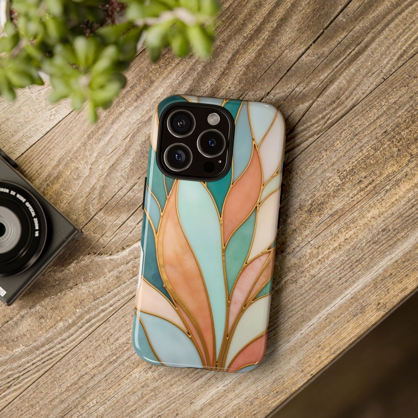Geometric Leaves: Teal, Peach, and Gold Harmony