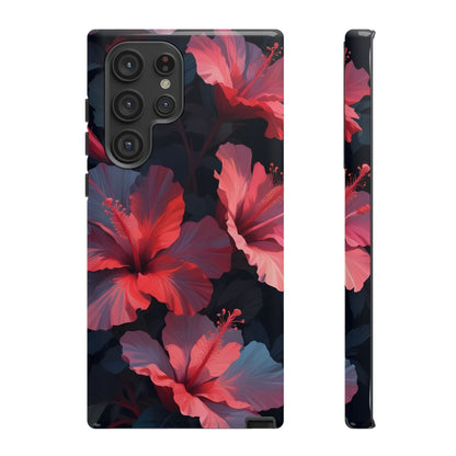 Vibrant red and pink hibiscus flowers blooming against a dark background| Floral phone case design