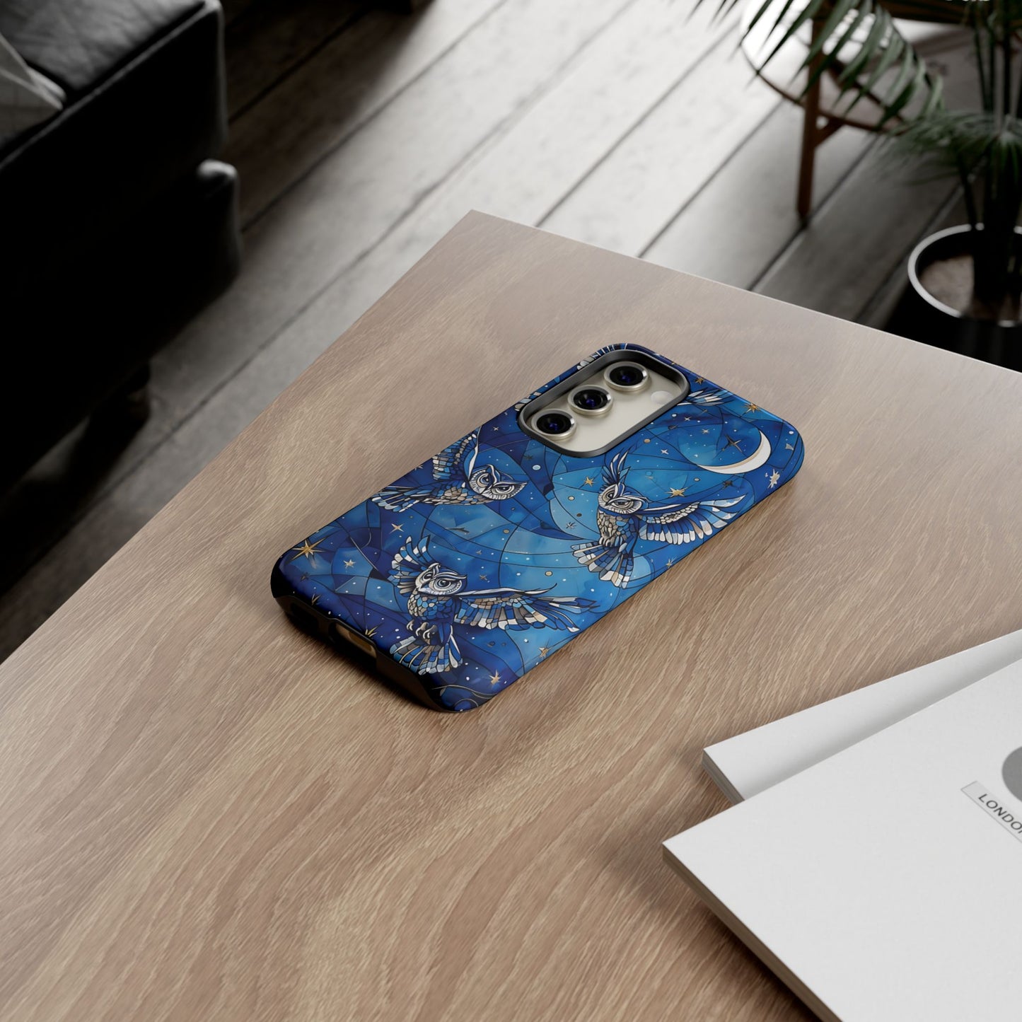 Surrealistic Owls Soaring Through A Celestial Night Sky phone case design.