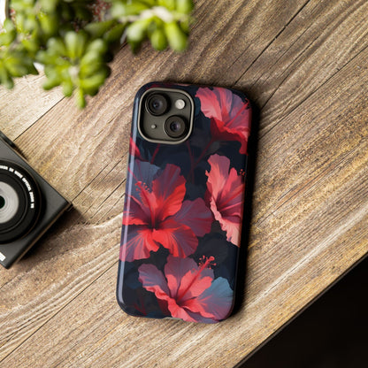 Vibrant red and pink hibiscus flowers blooming against a dark background| Floral phone case design