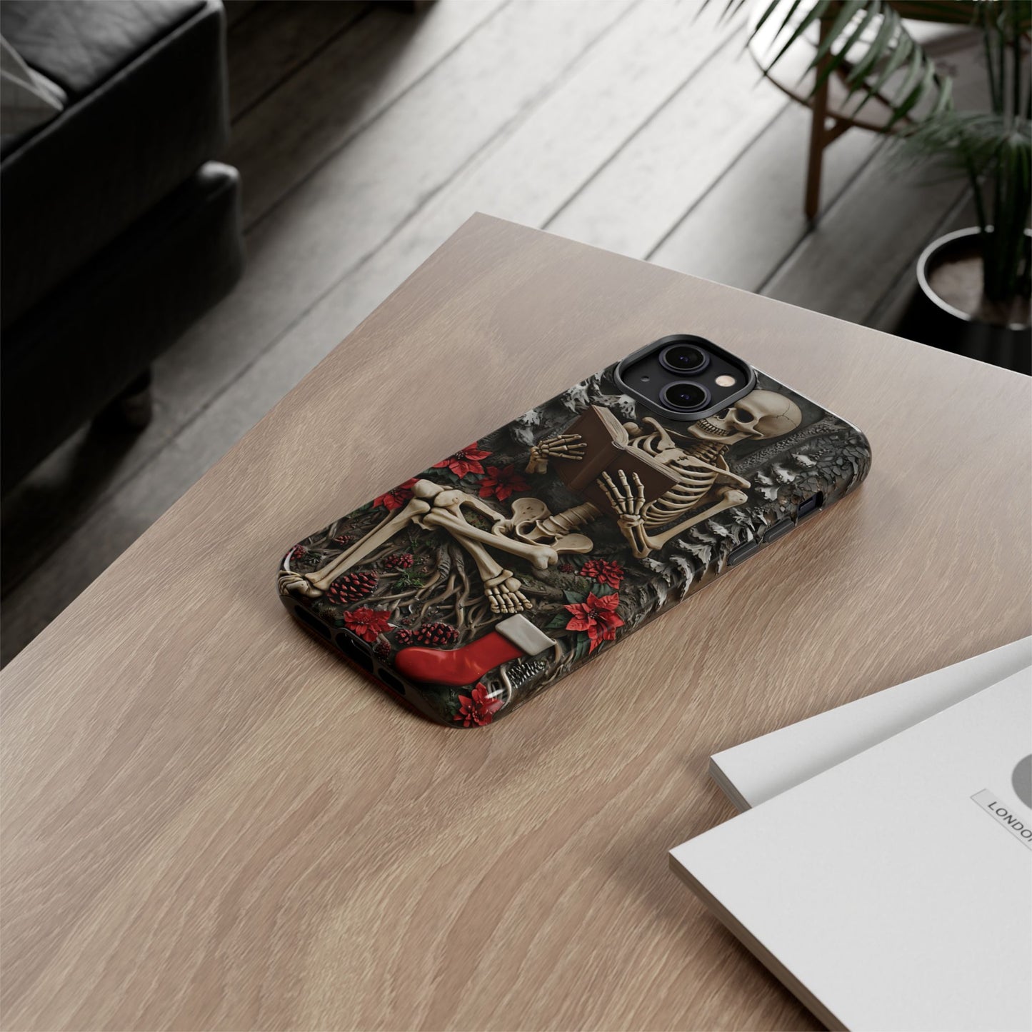 Surreal Relief Sculpture of Skeleton Reading Amidst Festive Decor phone case design