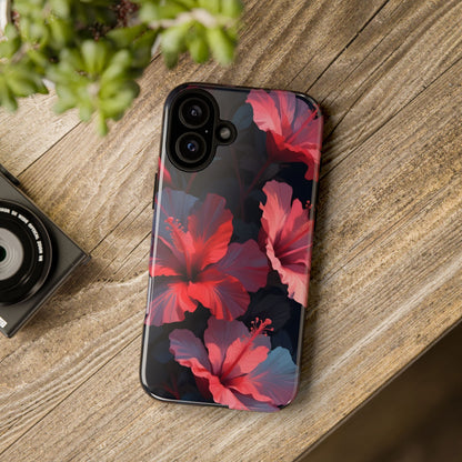 Vibrant red and pink hibiscus flowers blooming against a dark background| Floral phone case design