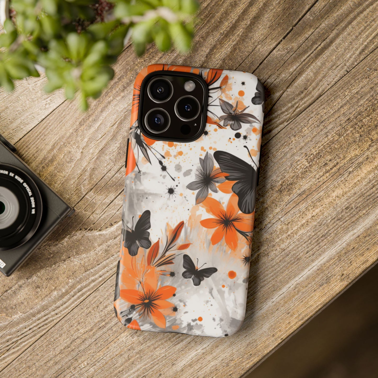 Bold Butterfly & Floral Splash Mobile Cover – Black & Orange Aesthetic