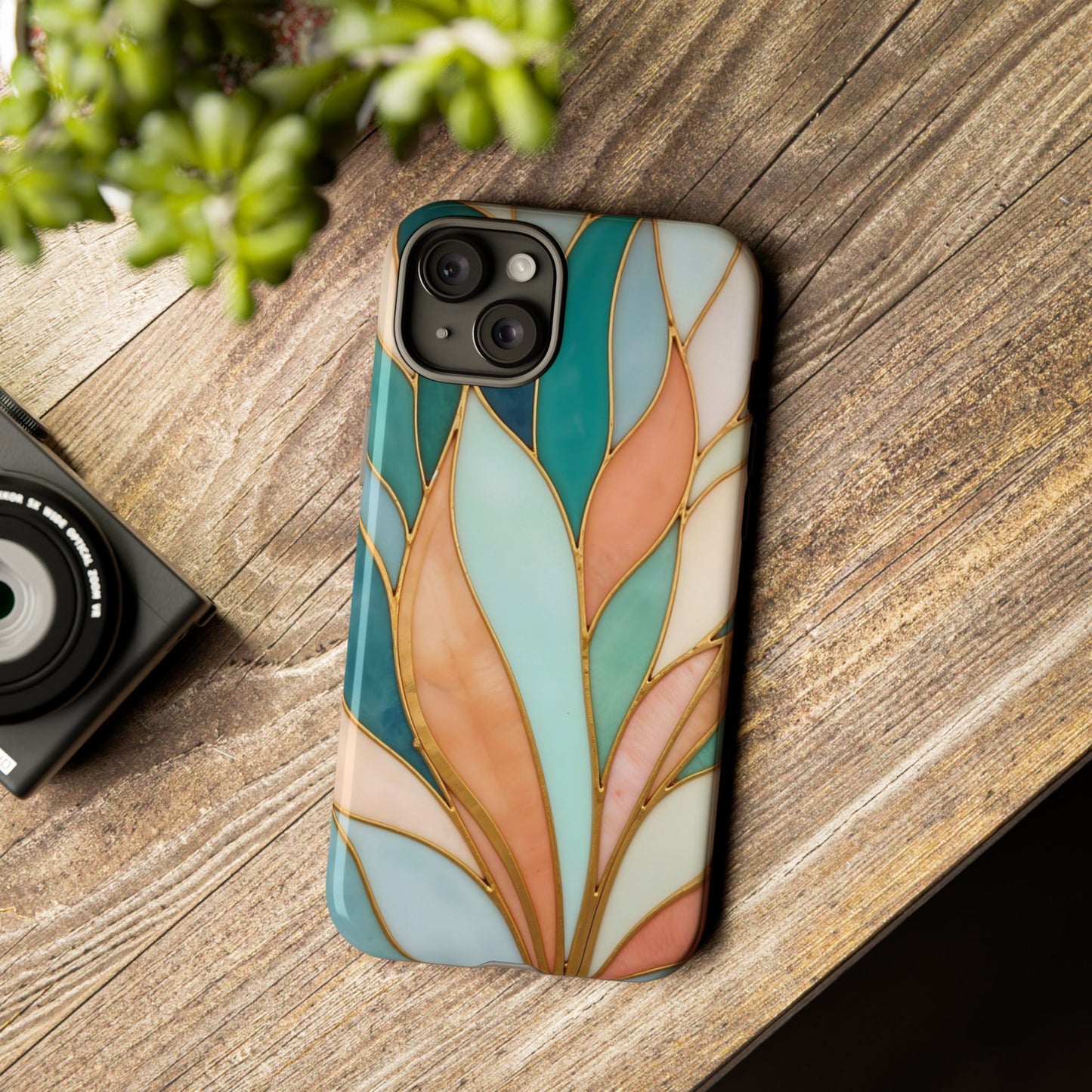 Geometric Leaves: Teal, Peach, and Gold Harmony