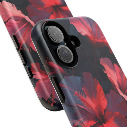 Vibrant red and pink hibiscus flowers blooming against a dark background| Floral phone case design