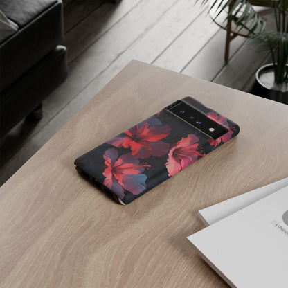 Vibrant red and pink hibiscus flowers blooming against a dark background| Floral phone case design