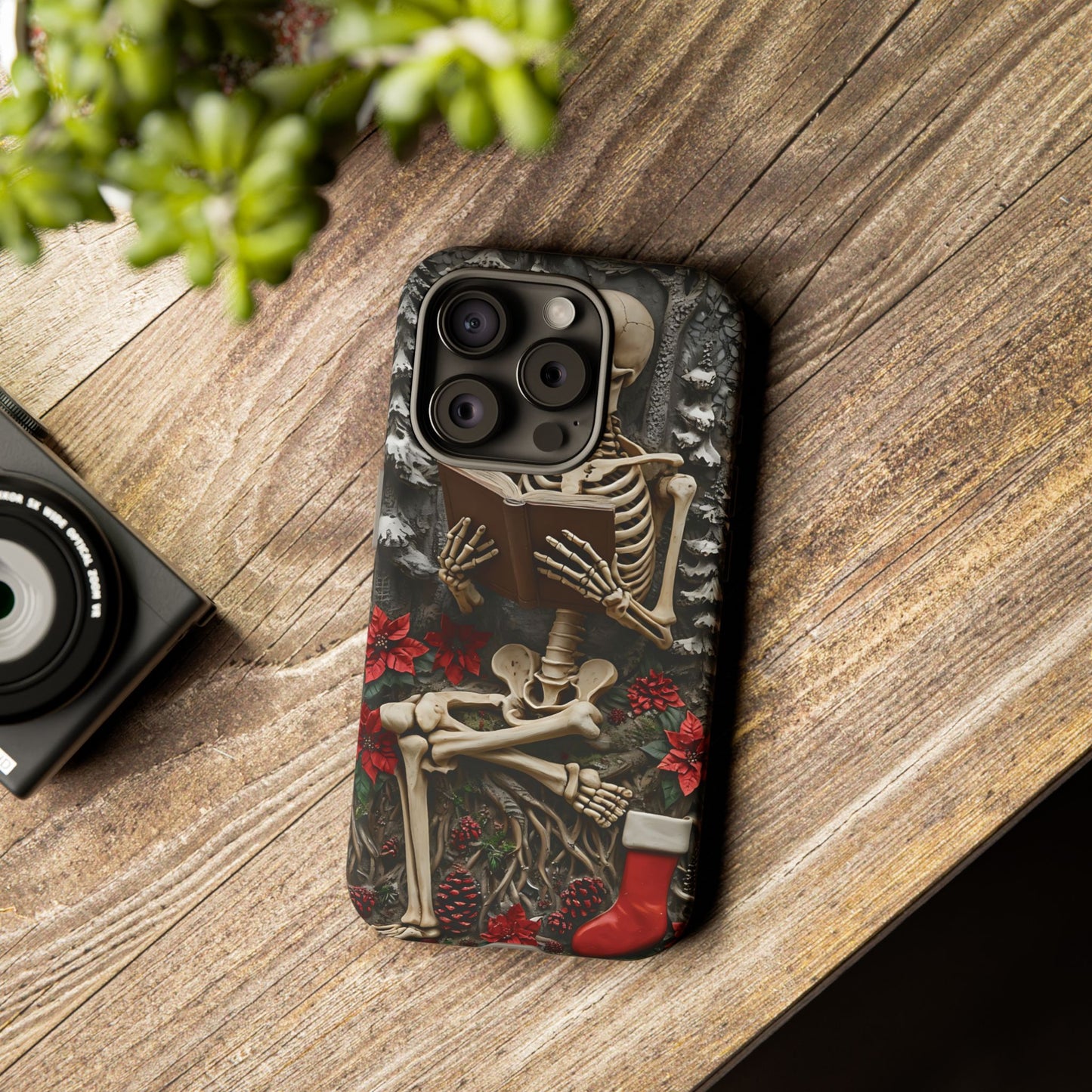 Surreal Relief Sculpture of Skeleton Reading Amidst Festive Decor phone case design