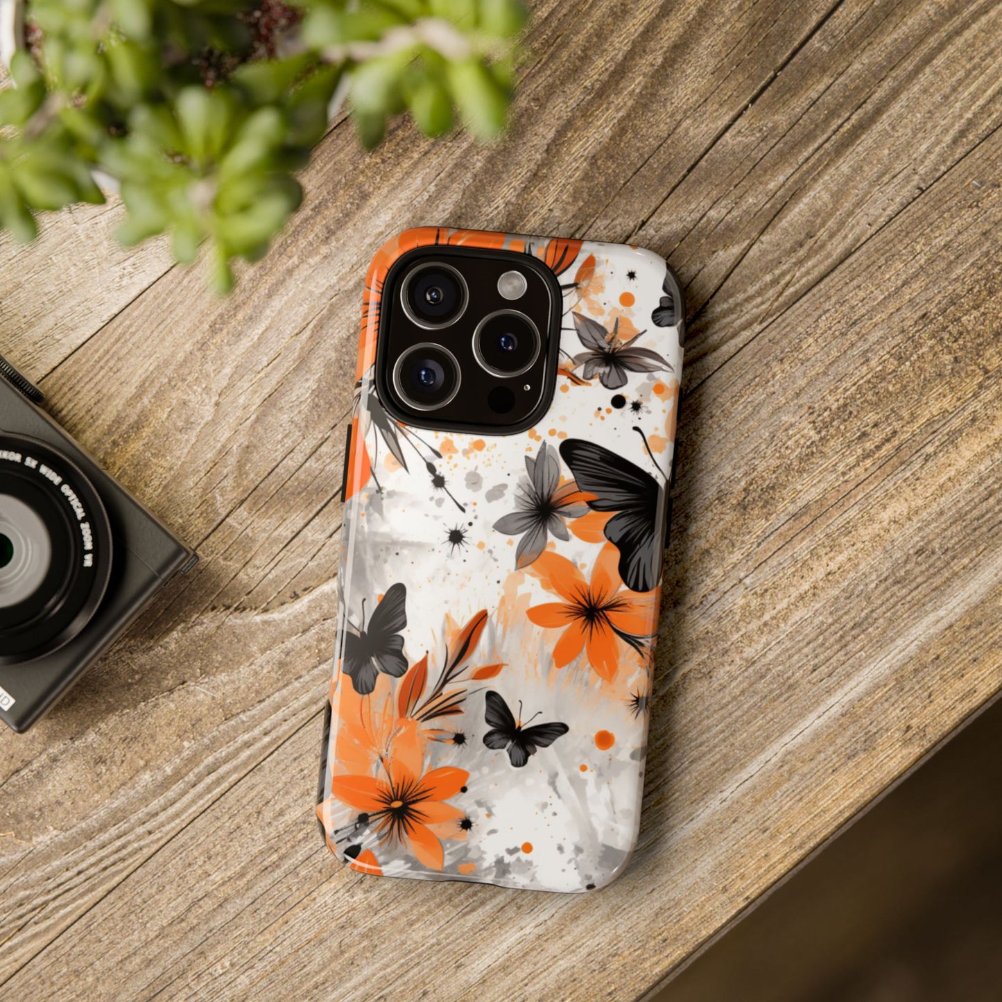 Bold Butterfly & Floral Splash Mobile Cover – Black & Orange Aesthetic