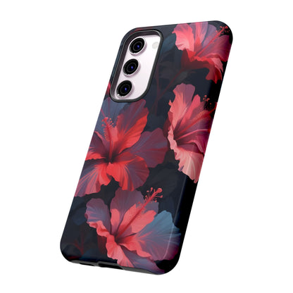 Vibrant red and pink hibiscus flowers blooming against a dark background| Floral phone case design