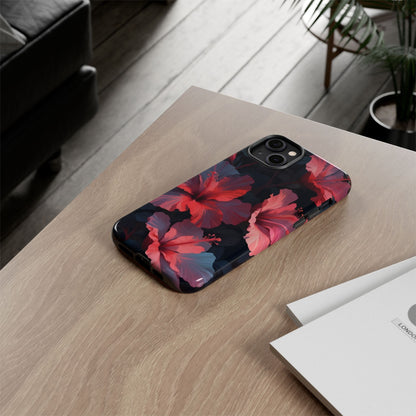 Vibrant red and pink hibiscus flowers blooming against a dark background| Floral phone case design