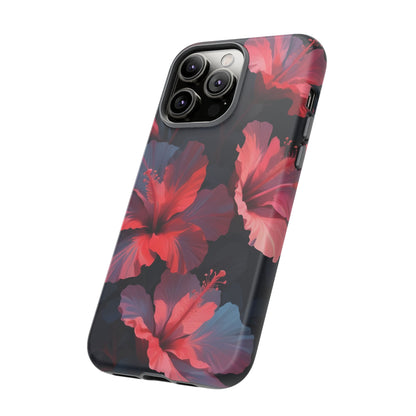 Vibrant red and pink hibiscus flowers blooming against a dark background| Floral phone case design